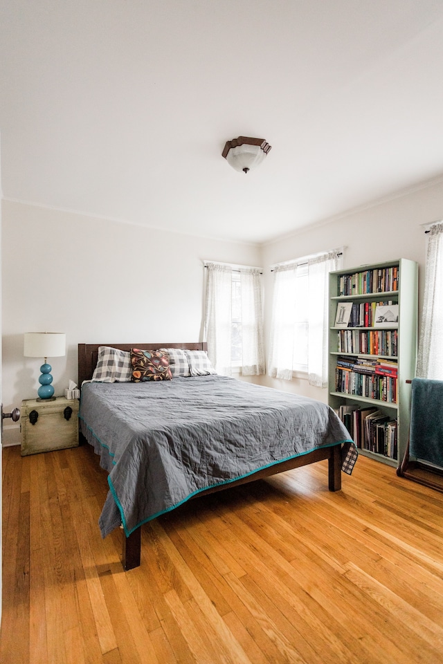 bedroom featuring hardwood / wood-style flooring