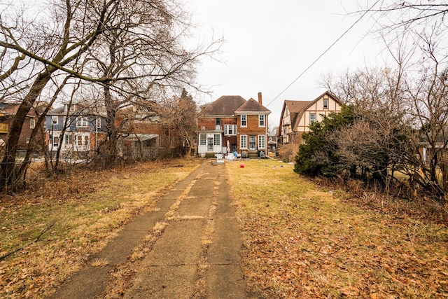 view of front of home featuring a chimney