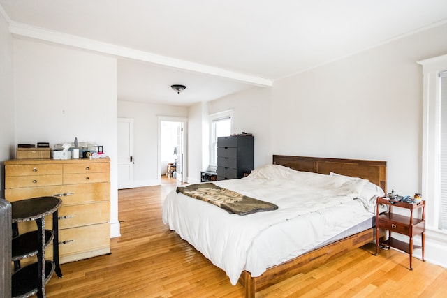 bedroom featuring wood finished floors