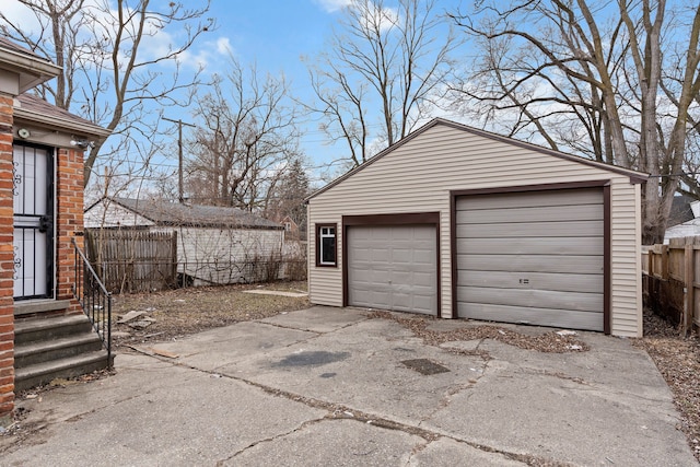 detached garage with fence