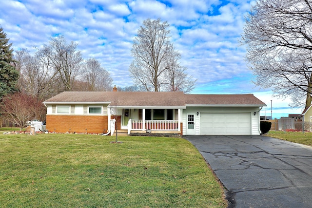 single story home featuring a front lawn, aphalt driveway, covered porch, an attached garage, and a chimney