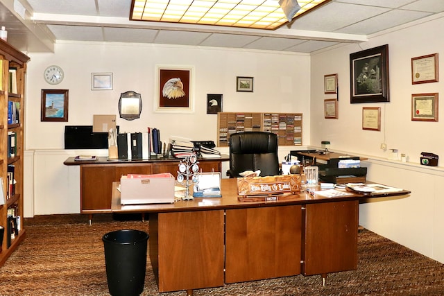 office featuring a paneled ceiling