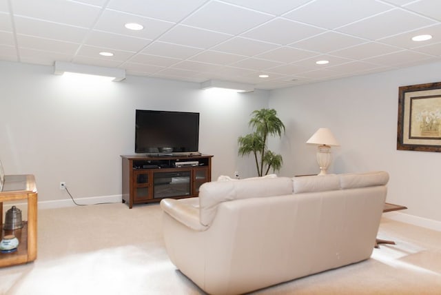 living room featuring recessed lighting, a paneled ceiling, baseboards, and light colored carpet