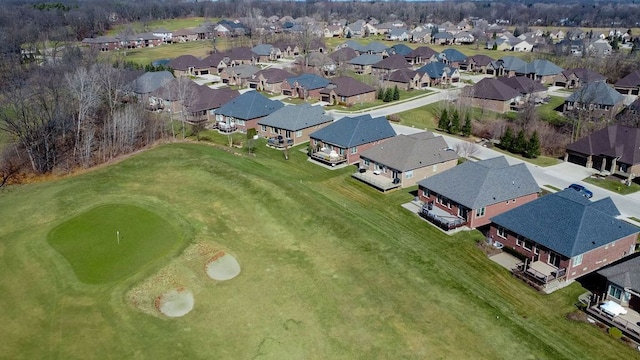 birds eye view of property with a residential view