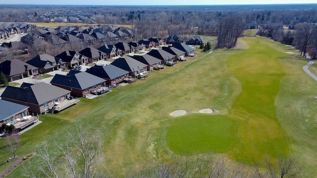 aerial view with a residential view and view of golf course