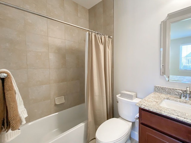 bathroom featuring shower / bath combo with shower curtain, toilet, and vanity