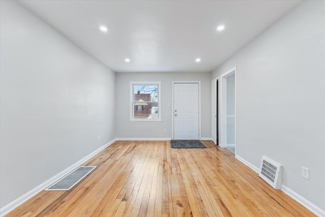 interior space with visible vents, recessed lighting, light wood-type flooring, and baseboards