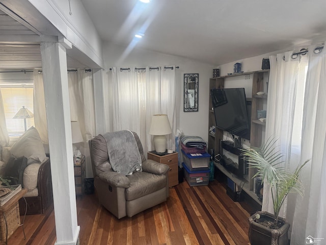 sitting room featuring lofted ceiling and wood finished floors