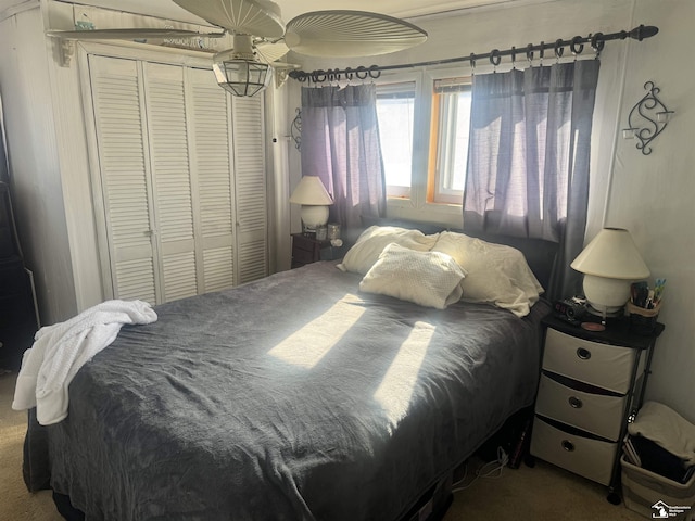 carpeted bedroom with a closet