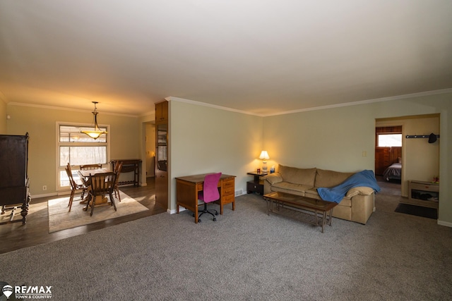 living room with baseboards, carpet, and ornamental molding