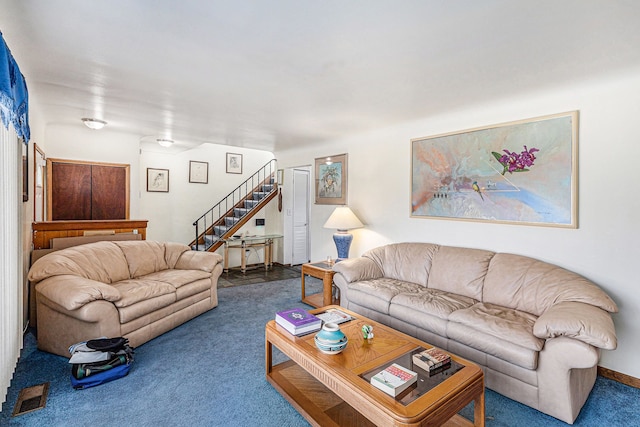 living room with visible vents, carpet flooring, stairway, and baseboards