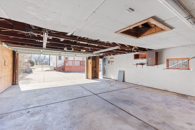 garage featuring a garage door opener