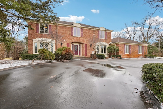 view of front of home with brick siding