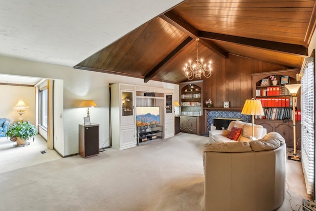 living area featuring vaulted ceiling with beams, a chandelier, wood ceiling, carpet flooring, and a fireplace