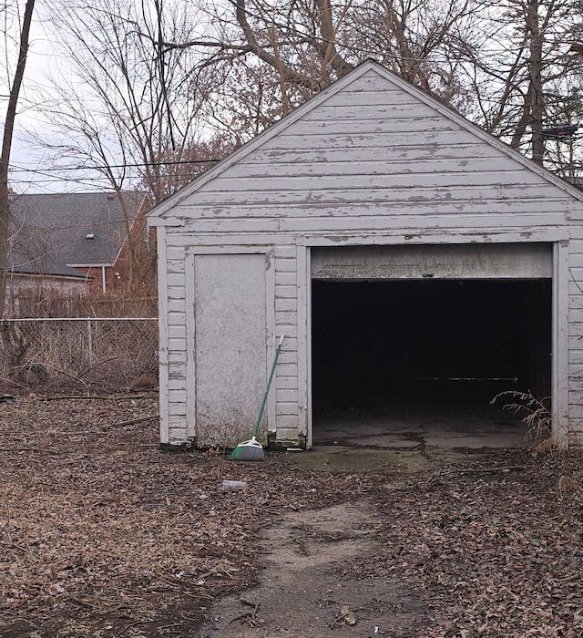 garage featuring fence