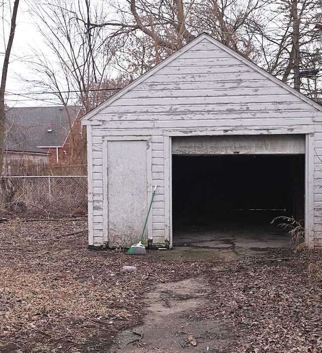 garage featuring fence