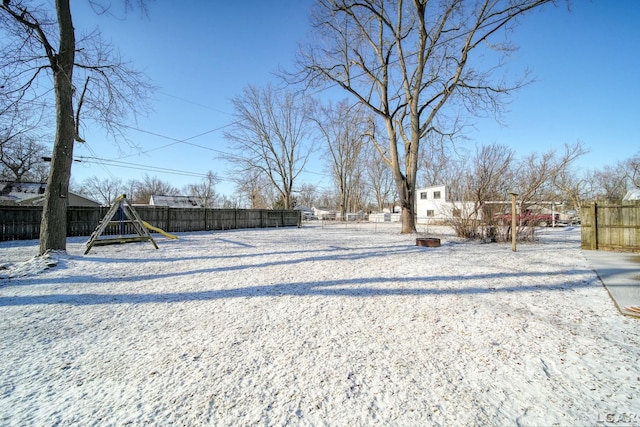 view of yard featuring fence private yard and playground community