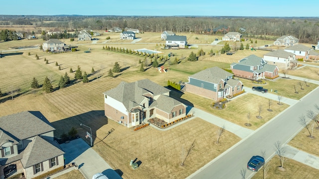 birds eye view of property with a residential view