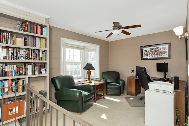 office area featuring ceiling fan and crown molding