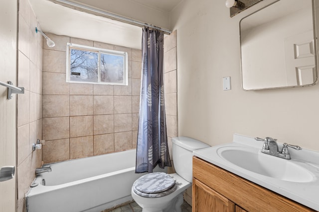 bathroom featuring toilet, shower / bath combo, and vanity