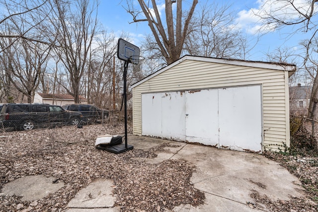 garage featuring fence