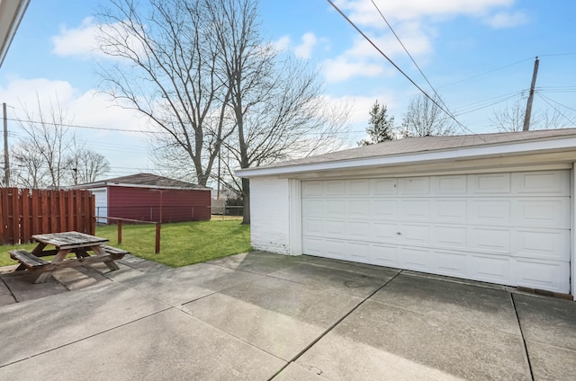 detached garage with fence