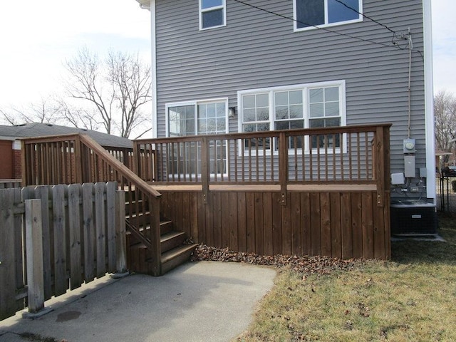 back of house with a deck, stairway, and cooling unit