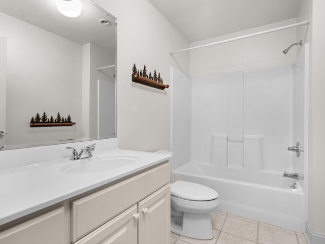 full bath featuring vanity, tile patterned floors, toilet, and  shower combination