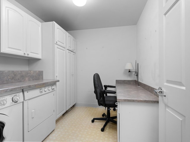 office area featuring washing machine and dryer, baseboards, and light floors