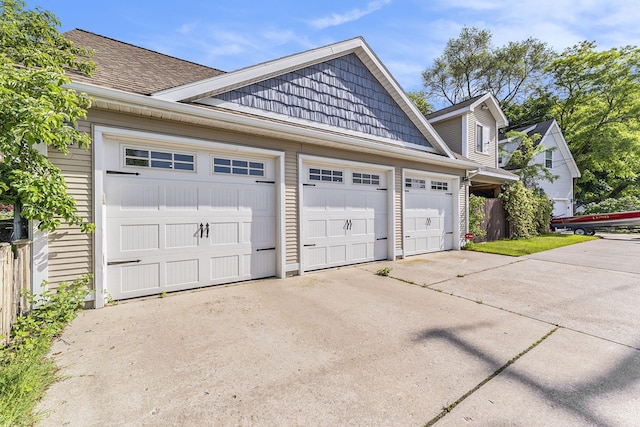 garage featuring driveway