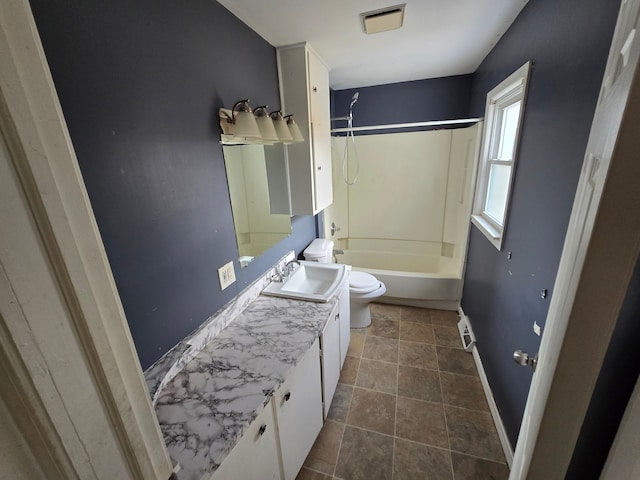 bathroom with vanity, baseboards, visible vents, shower / washtub combination, and toilet