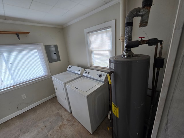 washroom featuring electric panel, washing machine and dryer, water heater, crown molding, and laundry area