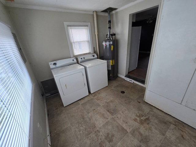 washroom featuring water heater, laundry area, independent washer and dryer, and crown molding