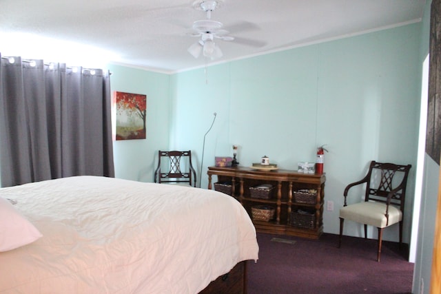 bedroom featuring crown molding and carpet