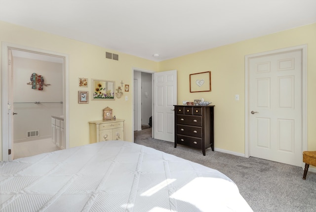 bedroom with visible vents, baseboards, and carpet