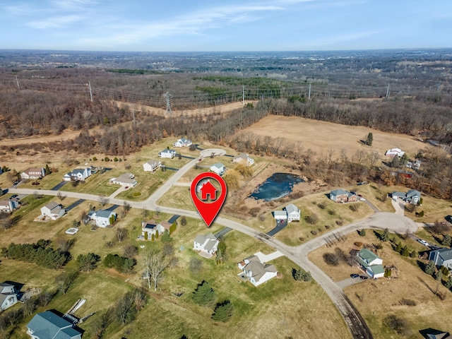 birds eye view of property with a rural view