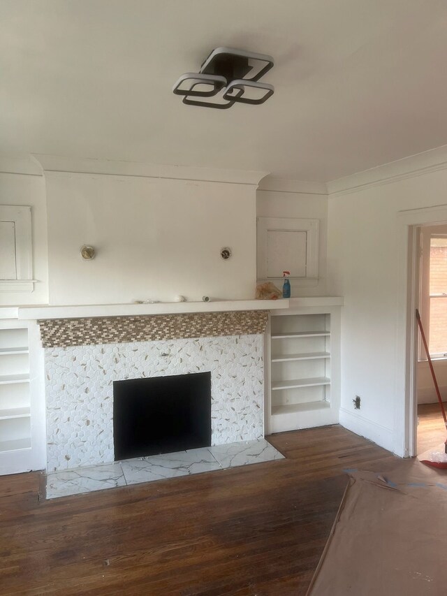 details featuring crown molding and wood finished floors