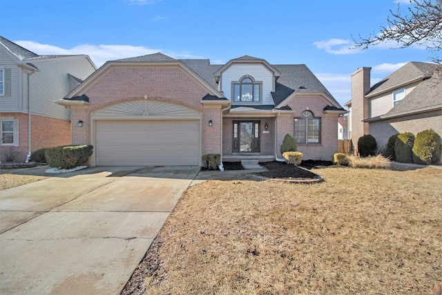 view of front facade featuring a garage, brick siding, driveway, and a shingled roof