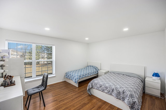 bedroom featuring recessed lighting, baseboards, and wood finished floors