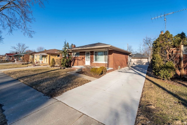 single story home with a front lawn, an outbuilding, a chimney, and brick siding