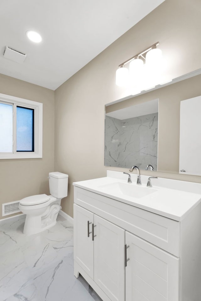 bathroom with visible vents, toilet, marble finish floor, baseboards, and vanity