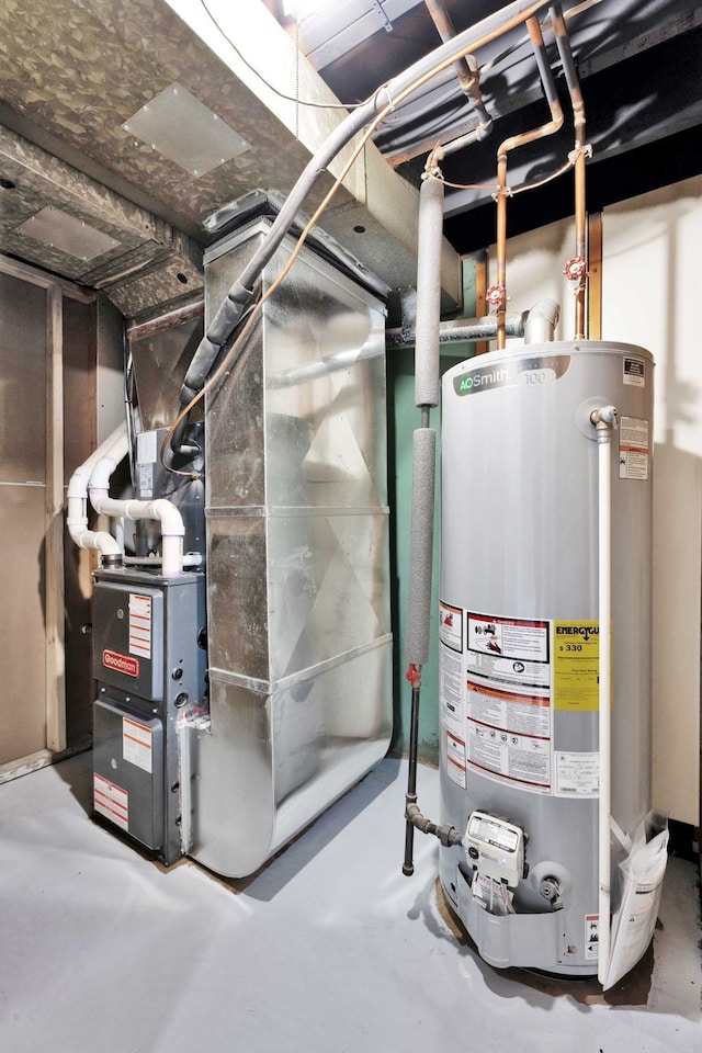 utility room with gas water heater and heating unit