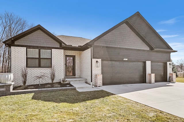 view of front of house featuring a garage, brick siding, concrete driveway, and a front yard