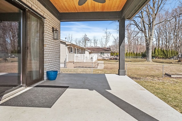 view of patio / terrace featuring a ceiling fan and fence