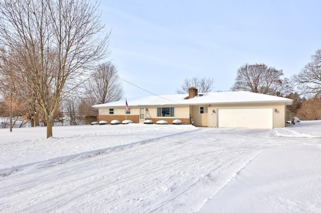 single story home featuring an attached garage and a chimney