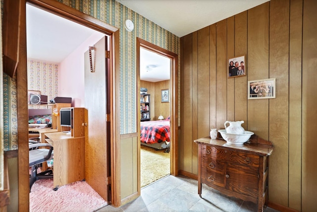 corridor featuring wallpapered walls