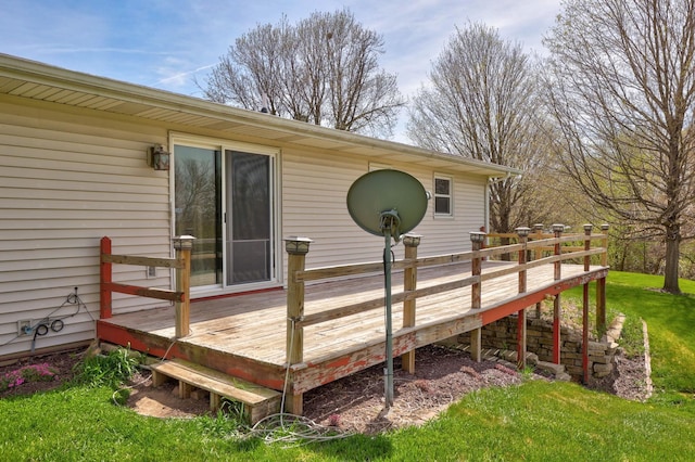 wooden deck with a yard