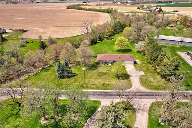 birds eye view of property with a rural view