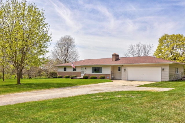 single story home with concrete driveway, a chimney, a front yard, and a garage