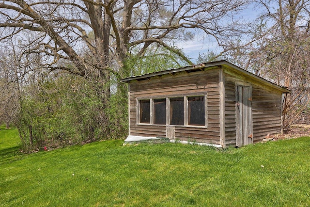 view of outbuilding featuring an outdoor structure